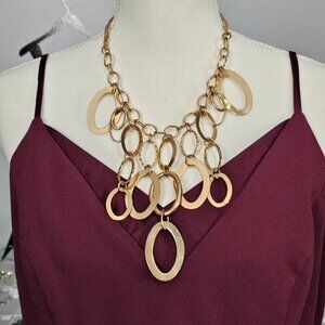 🏆Paparazzi A Golden Spell Gold Tone Link Ring Bib Statement Necklace
